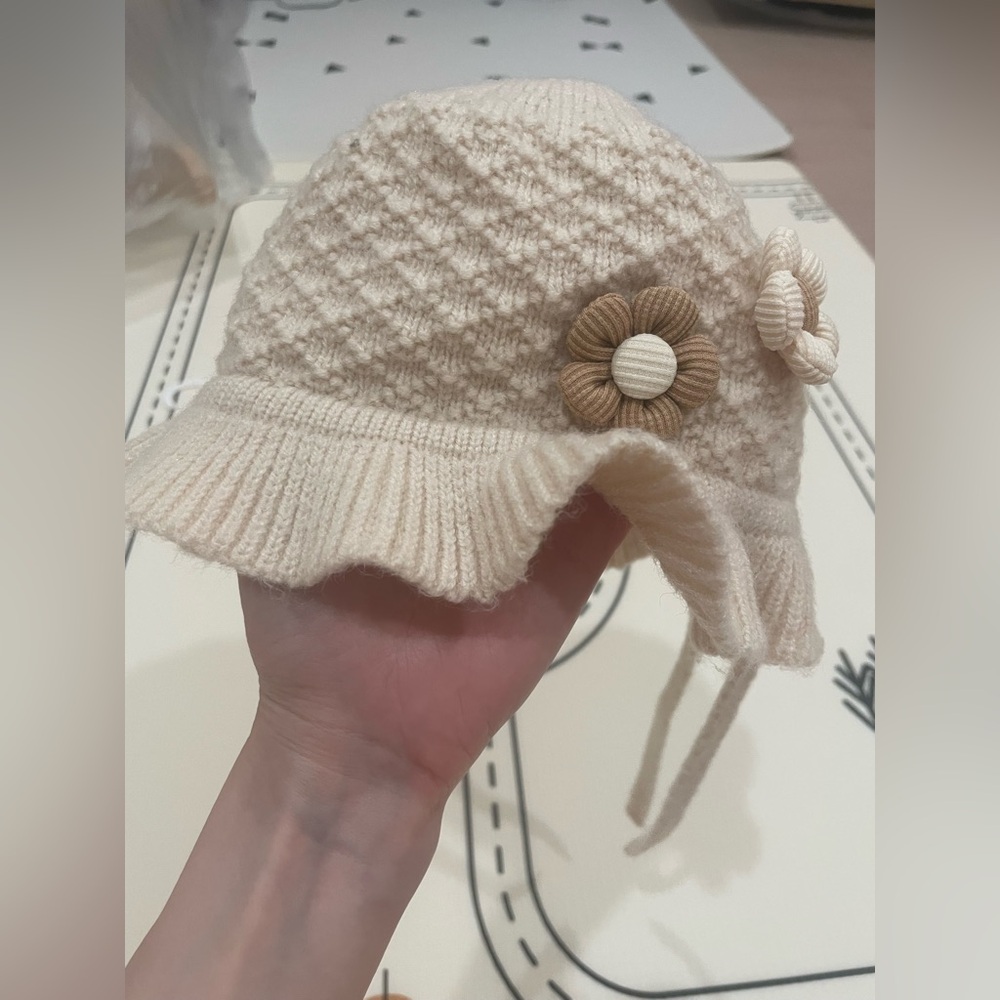 Cream Knit Baby Hat with Flower Accents